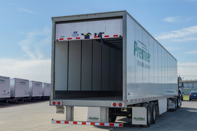 Overhead door of a Premier trailer being opened