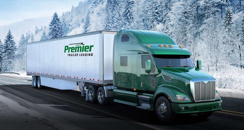 Premier dry van on an icy road in the winter